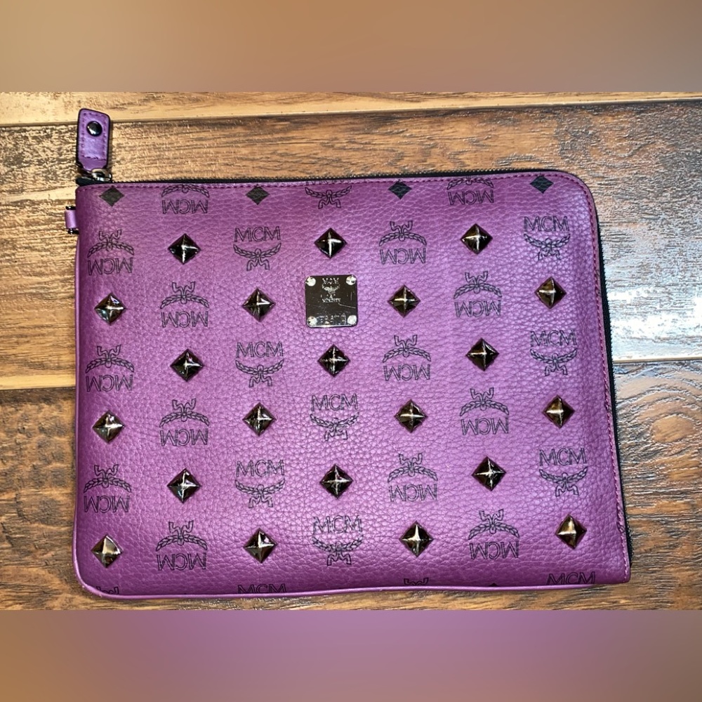 MCM studded leather clutch bag
